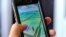 Pokemon Go is displayed on a cell phone in Los Angeles on Friday, July 8, 2016.