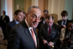 Senate Minority Leader Chuck Schumer, D-N.Y., talks to reporters following a Democratic strategy meeting at the Capitol in Washington, Feb. 11, 2020.