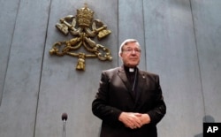 Cardinal George Pell arrives to make a statement, at the Vatican, June 29, 2017.