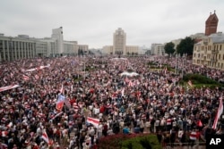 FILE - Belarusian opposition supporters rally at Independence Square in Minsk, Belarus, on Aug. 23, 2020. Alexander Lukashenko's reelection that year was seen by the opposition and the West as fraudulent, sparking the largest protests ever in Belarus.