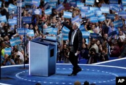 Former Democratic Presidential candidate, Sen. Bernie Sanders, I-Vt., takes the stage during the first day of the Democratic National Convention in Philadelphia, July 25, 2016.