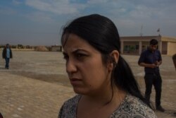 Nasreen Ali, 25, says the chaos in northeastern Syria is terrifying, with no clear information coming from any government involved, near Tal Tamer, Syria, Oct. 21, 2019 . (Yan Boechat/VOA)