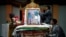 Tibetans arrange a portrait of the Dalai Lama during a function organized to mark his 82nd birthday in Lalitpur, Nepal, July 6, 2017. 