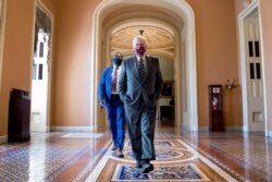 Senate Majority Leader Mitch McConnell walks off the Senate floor on Capitol Hill in Washington, July 29, 2020.