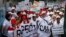 FILE - Indian people march during a 'I Respect Women' walk for gender equality organized by a local hotel and Association of Domestic Tour Operators of India in New Delhi, India.