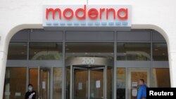 FILE PHOTO: A sign marks the headquarters of Moderna Therapeutics, which is developing a vaccine against the coronavirus disease (COVID-19), in Cambridge, Mass., May 18, 2020. 