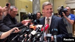 FILE - New Zealand Finance Minister and Deputy Prime Minister Bill English speaks to members of the media in Wellington, New Zealand, Dec. 5, 2016. 