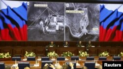 Pejabat Kementerian Pertahanan Rusia dalam sebuah rapat di Moskow (2/15). (Reuters/Sergei Karpukhin)