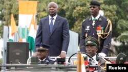 Rescuers pull a rubber boat carrying locals through a flooded street after Typhoon Vamco hit in Marikina City, outside Manila, Philippines.