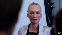 FILE - In this image released on Monday, Aug. 6, 2018, Sophia, a humanoid robot developed by Hanson Robotics, will welcome visitors to the new.New Festival in Stuttgart taking place on October 8-10 at the Hanns-Martin-Schleyer-Halle. (Hanson Robotics Limited/CODE_n via AP Images)