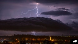 Lightning strikes over the sky in Nagykanizsa, Hungary, June 26, 2020. (Photo: Gyorgy Varga/MTI via AP)