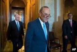 FILE - Senate Minority Leader Chuck Schumer, D-N.Y., leaves the chamber to meet with Senate Democrats on Capitol Hill in Washington, May 10, 2017.