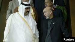 Afg'oniston prezidenti Hamid Karzay va Qatar amiri Shayx Hamad bin Xalifa al-Taniy