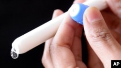 Gel mikrobida dalam aplikator di Rumah Sakit Baragwanath di Soweto, Afrika Selatan, yang ambil bagian dalam studi mikrobisida yang disebut CAPRISA 004.