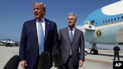 President Donald Trump and Robert O'Brien, just named as the new national security adviser, speak to the media at Los Angeles International Airport, Sept. 18, 2019.