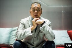 រូបឯកសារ៖ លោក​ Jimmy Lai ក្នុង​អំឡុង​ពេល​ផ្តល់​បទសម្ភាសន៍​ឱ្យ​ទីភ្នាក់ងារ​សារព័ត៌មាន AFP នៅទីក្រុង​ហុងកុង កាលពីថ្ងៃទី១៦ ខែមិថុនា ឆ្នាំ ២០២០។