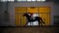 FILE - A Chinese jockey rides a horse at an equestrian and horse industry show in Beijing.