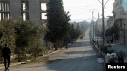 FILE - A view of a section of the road through the Qalamoun mountains used to transport Syria's chemical weapons.