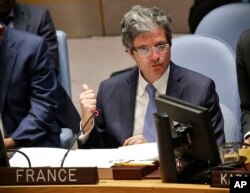 FILE - France's U.N. Ambassador Francois Delattre addresses a Security Council meeting on the Middle East, May 15, 2018 at U.N. headquarters.