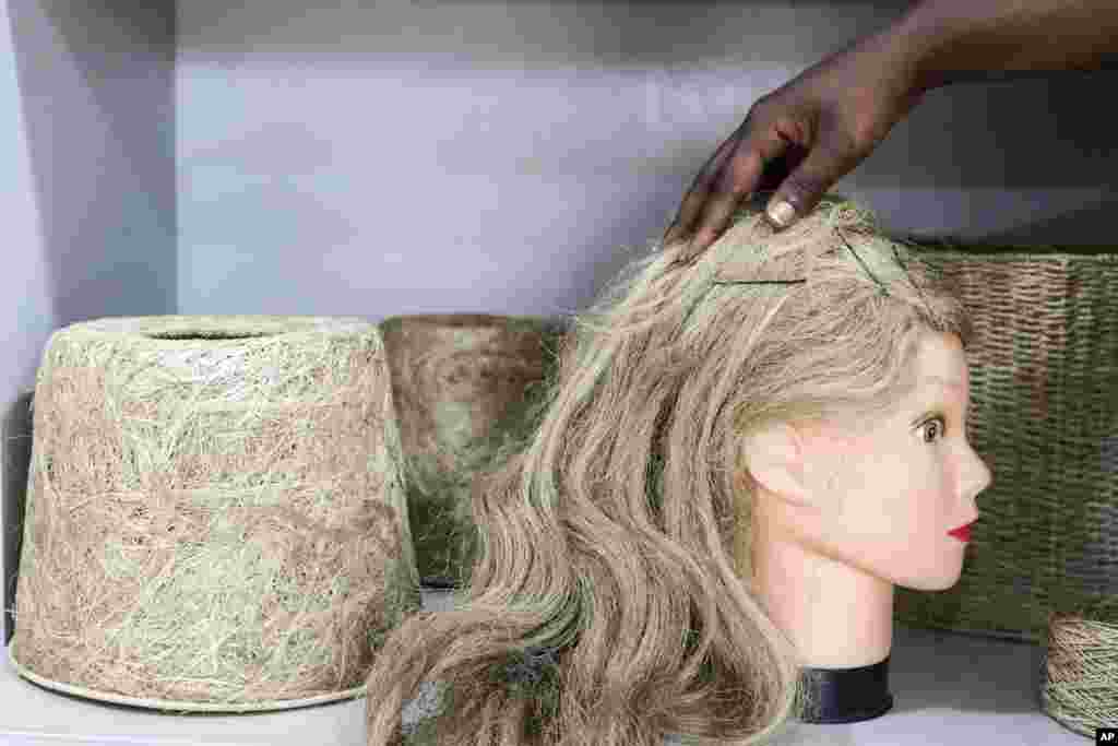 A view of a banana fiber wig and lampshades displayed at TEXFAD Showroom in Kira, Wakiso District, Uganda, Sept. 20, 2023.&nbsp;