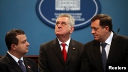 Serbian President Tomislav Nikolic, center, with Serbian Prime Minister Ivica Dacic, left, and President of Republika Srpska Milorad Dodik, Banja Luka, Bosnia, Dec. 26, 2012.