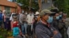 Ethiopians cast their votes in the general election at a polling center in the capital Addis Ababa, Ethiopia, June 21, 2021.