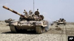 Vifaru vya jeshi la Iran vikiwa kwenye mazoezi. Picha ya AP Feb 22, 2025.