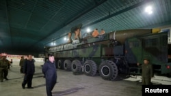 North Korean leader Kim Jong Un inspects the intercontinental ballistic missile Hwasong-14 in this undated photo released by North Korea's Korean Central News Agency (KCNA) in Pyongyang July 5, 2017.