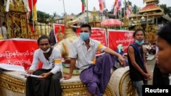 Buddhist monks and nationalists protest against the government near Shwedagon pagoda in Yangon, Myanmar, Aug. 3, 2017.