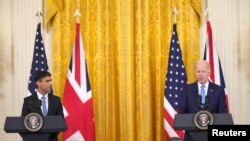 Britanski premijer Riši Sunak i američki predsednik Džo Bajden na sastanku u Beloj kući, 8. juna 2023. (Foto: Rojters/Niall Carson)
