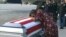 In this frame from video, Myeshia Johnson cries over the casket in Miami, Florida, Oct. 17, 2017, of her husband, Sgt. La David Johnson, who was killed in an ambush in Niger. 