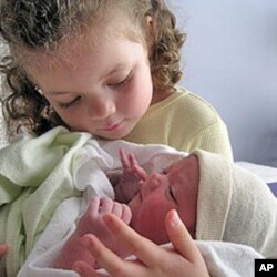 Stella Grace is welcomed to the world shortly after being delivered at home.