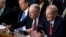 Sen. Bill Nelson, D-Fla., right, accompanied by Sen. John Thune, R-S.D., left, and Sen. Chuck Grassley, R-Iowa, second from left, before a joint hearing of the Commerce and Judiciary committees on Capitol Hill, April 10, 2018.