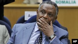 Eritrea Ambassador to AU, Girma Asmerom, listens as Secretary of State Hillary Rodham Clinton addresses the African Union at the African Union Commission headquarters in Addis Ababa, Ethiopia, June 2011. (file photo)