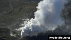 An aerial view shows Io Yama erupting in Miyazaki prefecture, on the southwest island of Kyushu, Japan, in this photo by Kyodo, April 19, 2018. 