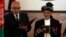 Afghanistan's new President Ashraf Ghani Ahmadzai (C) stands with his first vice prsedint Abdul Rashid Dostum (L) and second vice rresident Sarwar Danish as they take the oath during his inauguration as president in Kabul September 29, 2014. Afghanistan i