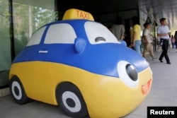 A mascot of Didi Chuxing is seen at the company's headquarters in Beijing, China, May 18, 2016