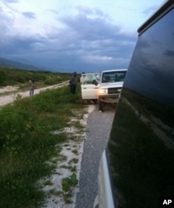 A stop on the highway to fix a flat tire