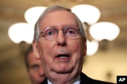 Senate Majority Leader Mitch McConnell, R-Ky., speaks to reporters on Capitol Hill in Washington, Dec. 11, 2018.