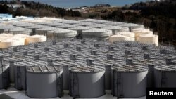 Storage tanks for radioactive water are seen at Tokyo Electric Power Co's (TEPCO) tsunami-crippled Fukushima Daiichi nuclear power plant in Okuma town, Fukushima prefecture, Japan, Feb. 18, 2019.