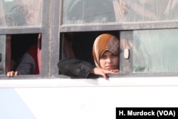 Women fleeing Mosul say IS forces girls as young as seven years old to wear headscarves for modesty in Gogjali, Mosul, Iraq, Nov. 7, 2016.
