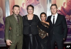 Actor Joel Edgerton, left, Peggy Loving a daughter of Richard and Mildred Loving, actress Ruth Negga and director Jeff Nichols attend the premiere of "Loving" at the Landmark Sunshine Cinema, Oct. 26, 2016, in New York.