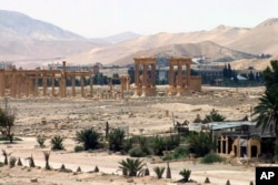 FILE - This file photo released May 17, 2015, by the Syrian official news agency SANA, shows the general view of the ancient Roman city of Palmyra, northeast of Damascus, Syria.