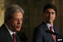 Canadian Prime Minister Justin Trudeau, right, and Prime Minister Paolo Gentiloni of Italy, hold a joint press conference in Ottawa, Ontario, April 21, 2017.