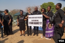 Parliament Speaker Richard Msowoya participates in a march protesting domestic violence in Lilongwe, Malawi, Sept. 14, 2017. (L Masina/VOA)