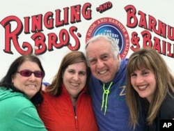 Gene Goldstein (center right) and his family stop for a photo outside the Nassau Veteran's Memorial Coliseum in Uniondale, N.Y., which is hosting the final performances of the Ringling Brothers and Barnum & Bailey Circus, May 20, 2017. From left are Cher