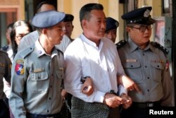 Kyi Lin, one of the accused of plotting muslim laywer Ko Ni's murder, arrives at Insein court as his lawyers deliver their final argument in Yangon, Myanmar, February 1, 2019.