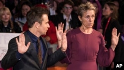 Actors Sam Rockwell and Frances McDormand, right, pose for photographers upon arrival at the premiere of the film 'Three Billboards Outside Ebbing, Missouri' showing as part of the closing gala of the BFI London Film Festival n London, Sunday, Oct. 15, 20