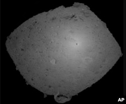 This Oct. 25, 2018, image provided by the Japan Aerospace Exploration Agency (JAXA) shows asteroid Ryugu.