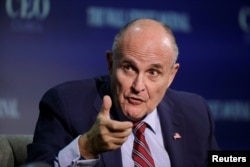 FILE - Rudy Giuliani, vice chairman of the Trump Presidential Transition Team, speaks at the Wall Street Journal CEO Council in Washington, Nov. 14, 2016.